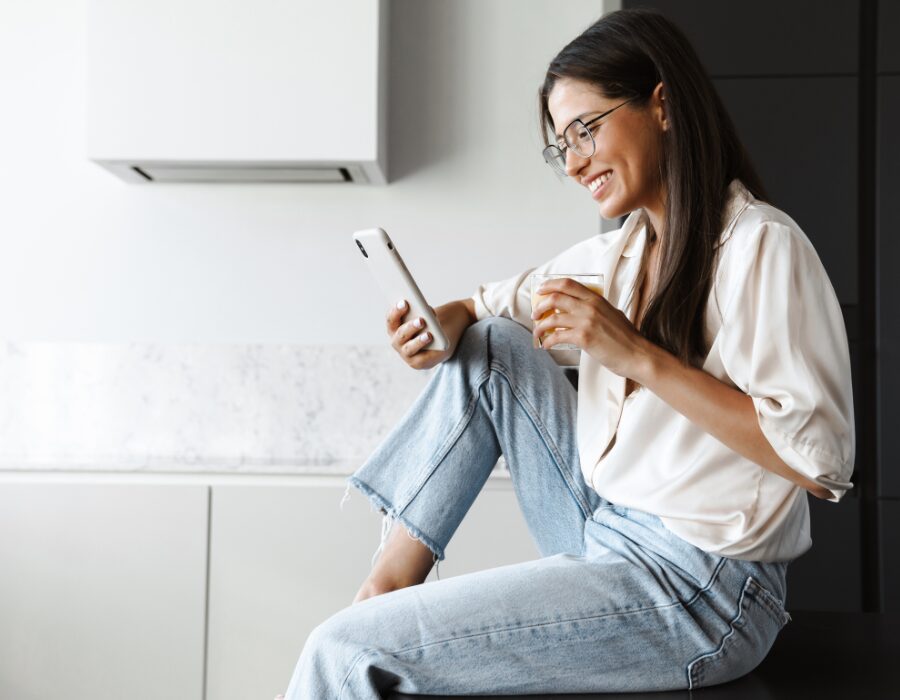Woman checking personalized winery offers on her phone