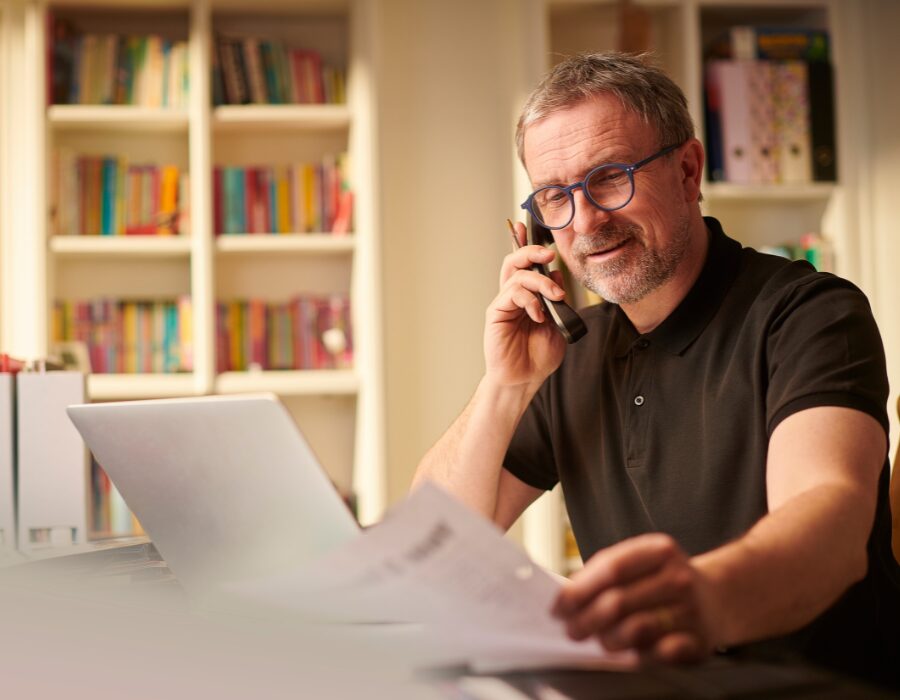 Winery owner checking marketing performance on his phone