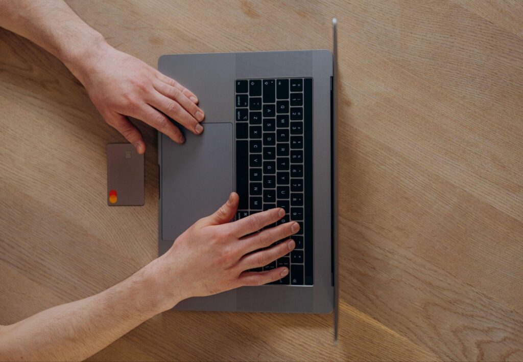 Processing wholesale orders on a laptop with a card reader