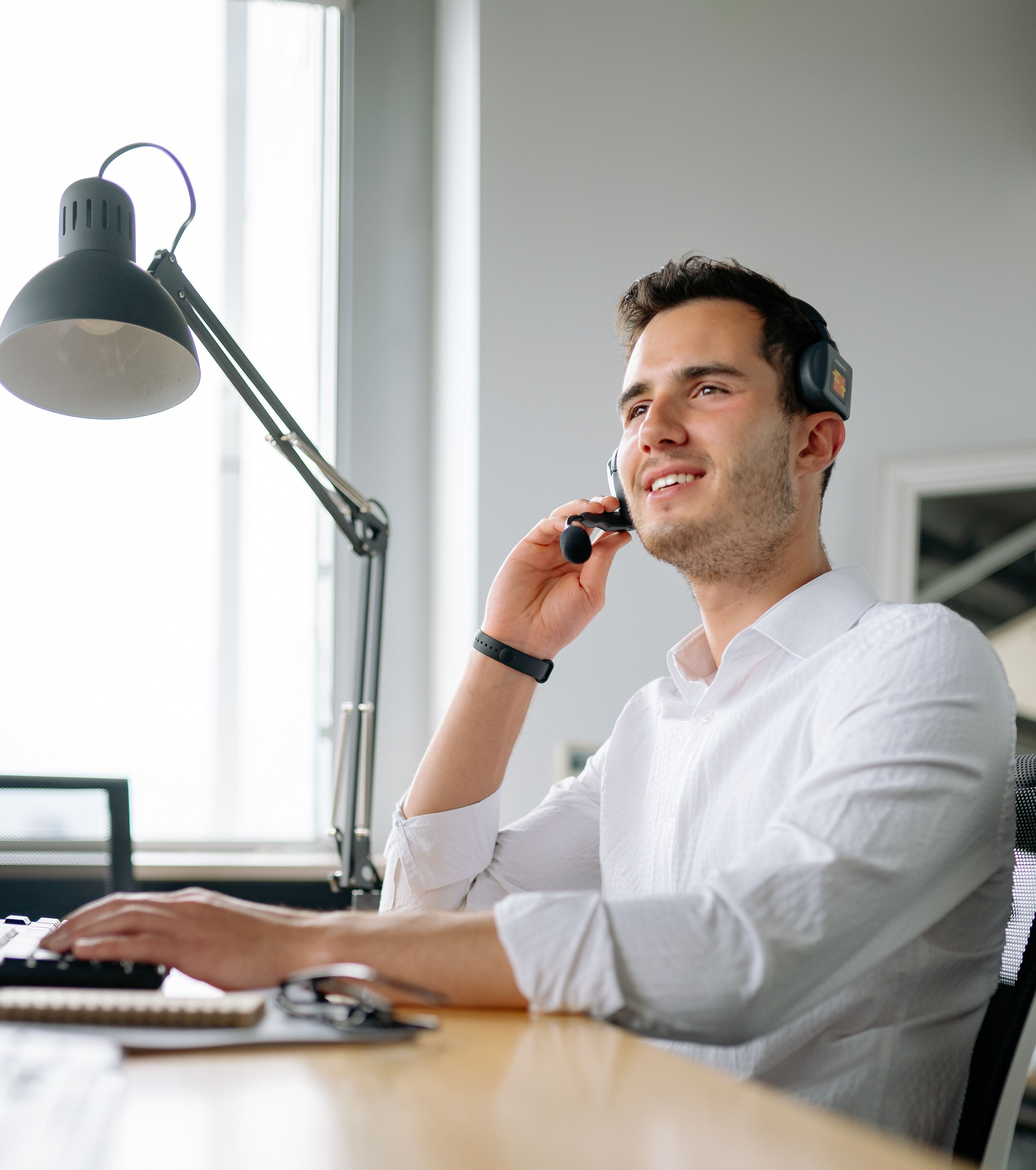 Bottle360 team member taking a phone call